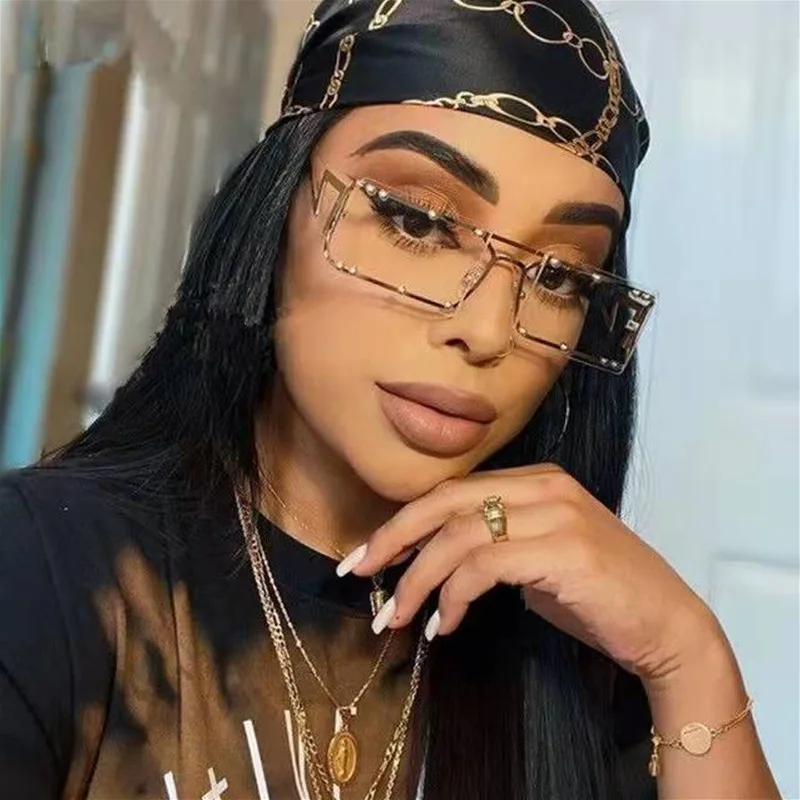 

2022 Trendy Rimless Sun Glasses Street Shooting Small Frame Rectangle Sunglasses Metal Punk Sunglasses