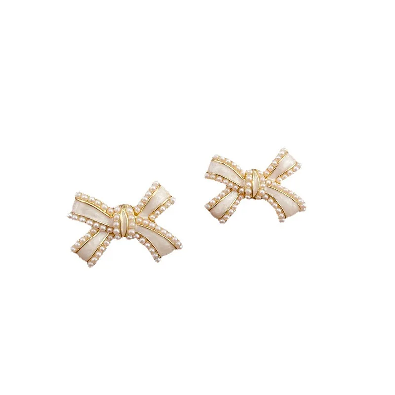 

Sandro French retro drop oil pearl bow earrings female personality temperament wild fashion earrings