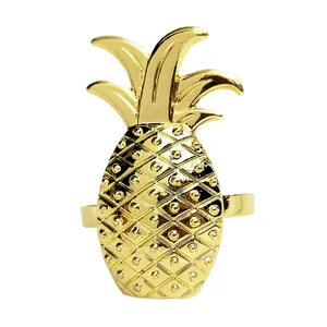 Image of gold pineapple napkin rings,autumn fruit accessories