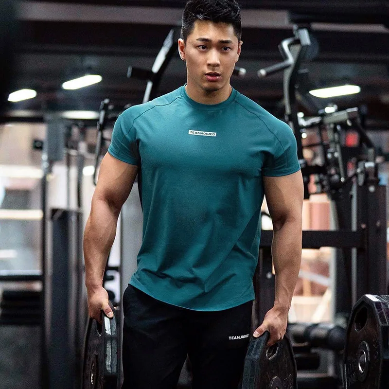 

Men's Quick-Dry T Shirt Elastic Absorbent Gym Clothing Manufacture Fitness Outdoor Leisure Slit Sports T-Shirt