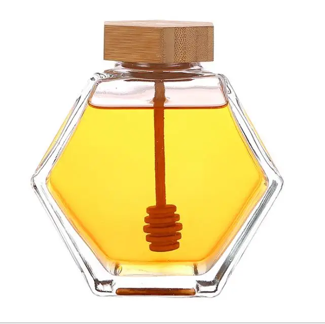 

Wholesale 220ml 380ml Bamboo Cover Empty Hexagon Natural Royal Honey Jar Container Glass Honey Jar With Stirring rod