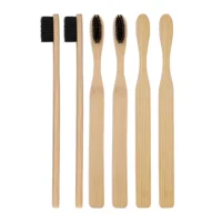 

natural bamboo biodegradable adult toothbrush with soft charcoal bristles vegan product BPA free zero waste