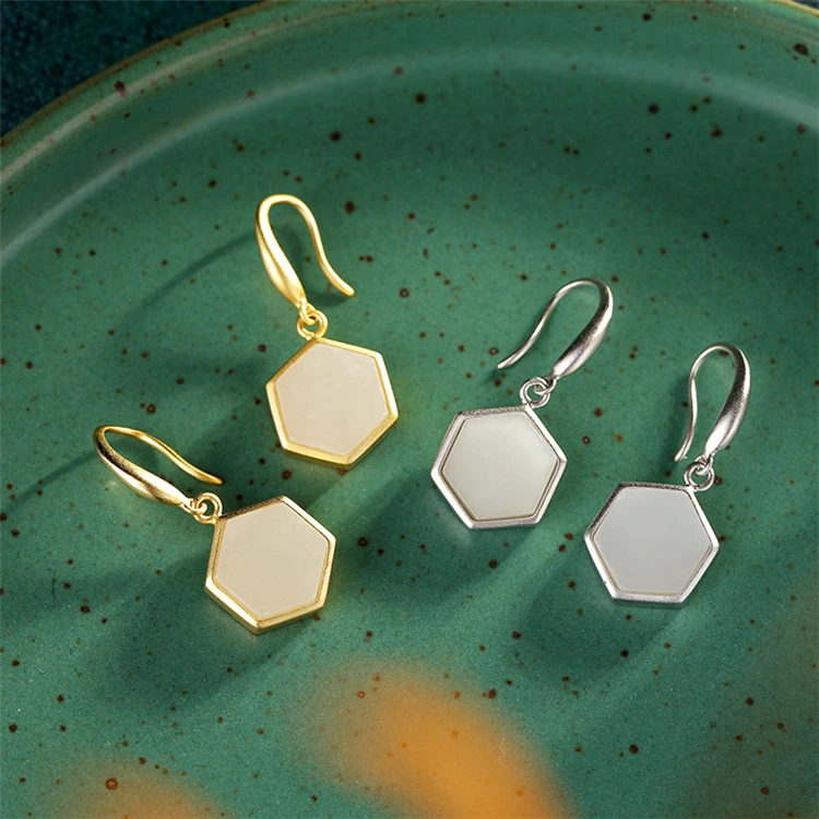 

Aimgal S925 silver personalized hexagonal inlay Hetian Jade White Jade gold-plated women's earrings AP2