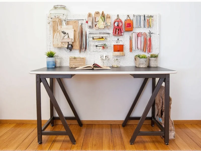 Customized IKEA craft table with pegboard organization