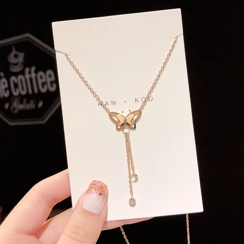 

New Sweet Design Gold Plated Titanium Steel Hollow Butterfly Tassel Necklace Rhinestone Butterfly Pendant Necklace