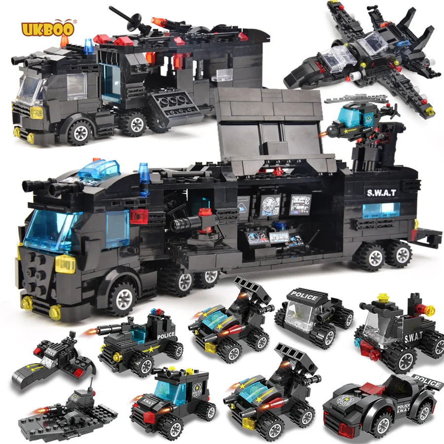 

Free Shipping UKBOO 785Pcs SWAT Police Station Truck Model Building Blocks City Machine Helicopter Car Figures Bricks
