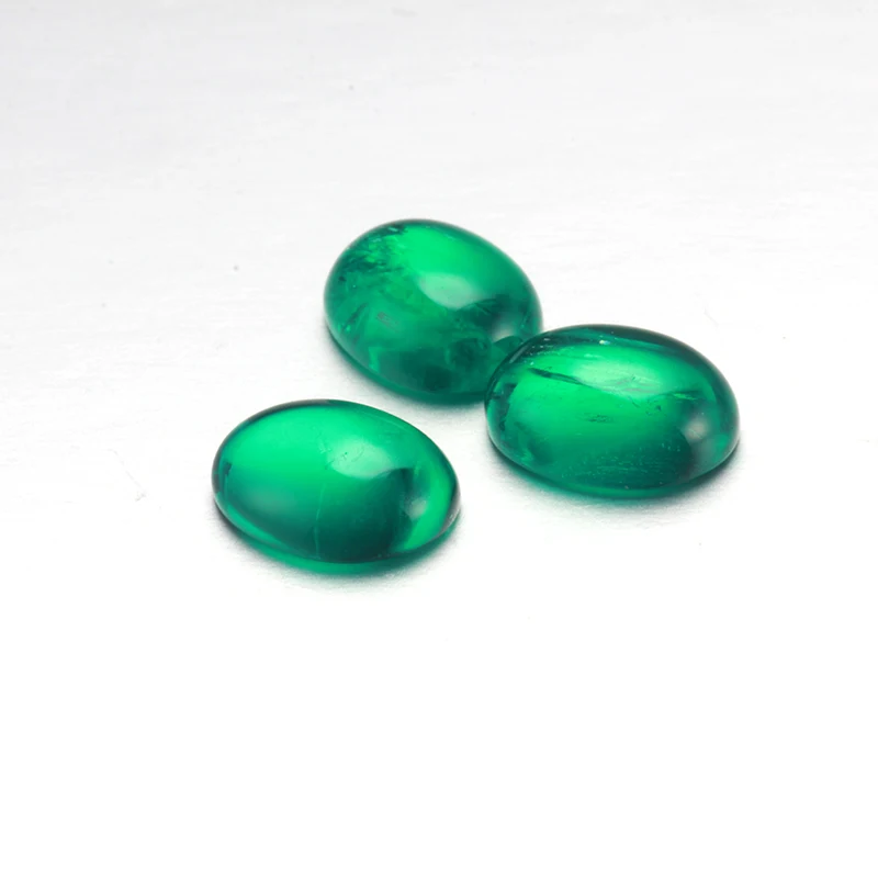 

4.45ct approx oval shaped cabochon cut well polished green color hydrothermal emerald