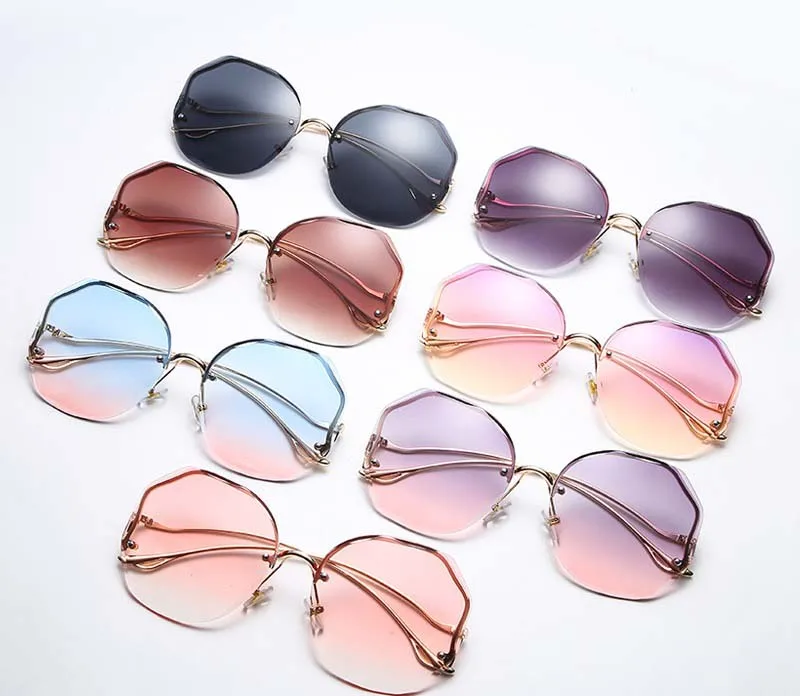 

Cut-Edge Round Sunglasses Women Retro Trendy Sunglasses Custom butterfly flower Rimless Sunglasses