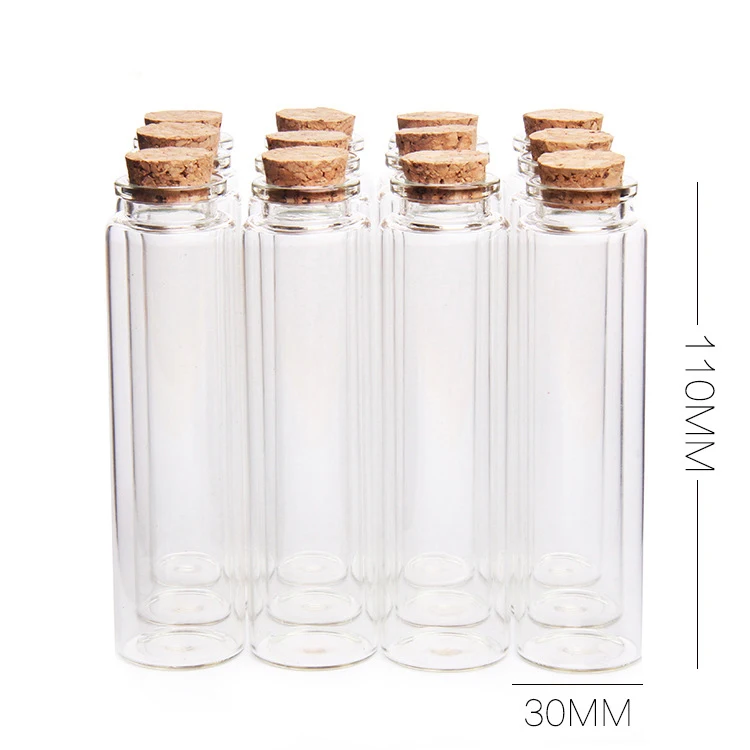 

Wholesale Transparent long neck small glass bottle with cork round lid packing 55ml