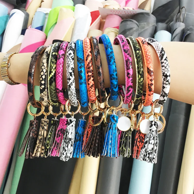 

Amazon Fashion Trend Snake Pattern PU Leather Tassel Drip Oil Discs Ladies Leather Bracelet Keychain, Colorful