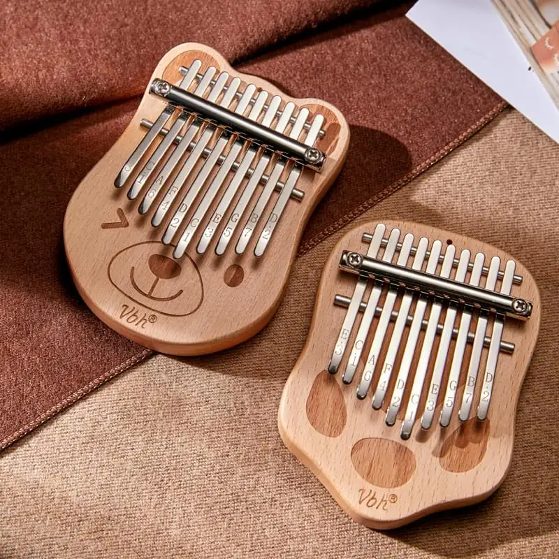 

2021 tol seller ubeta ladolurai kalimba 10 keys mini thumb piano sarangi musical instrument, Wooden,coffee,blue