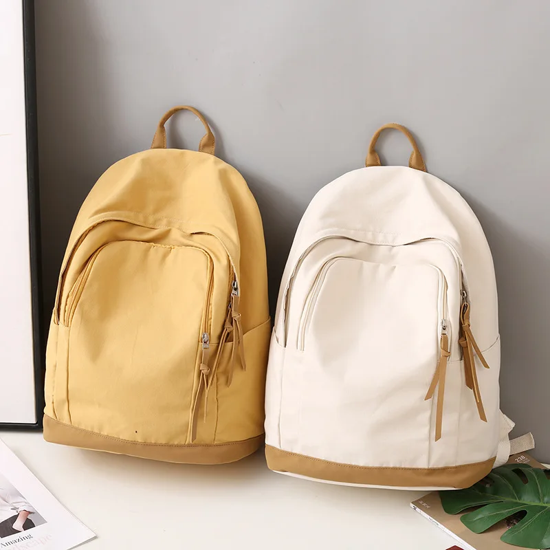 

Twinkle Custom New Korean Solid Retro Leisure Travel Canvas High School Schoolbag Fashion Backpack