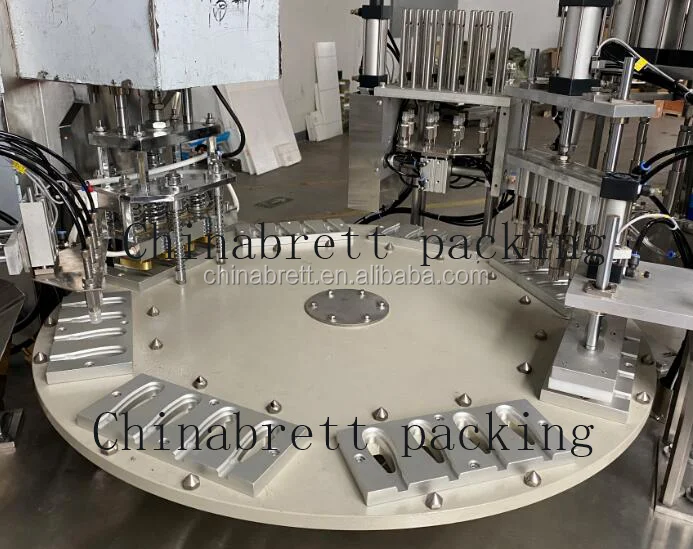 2020 Factory price rotary honey spoon filling sealing machine