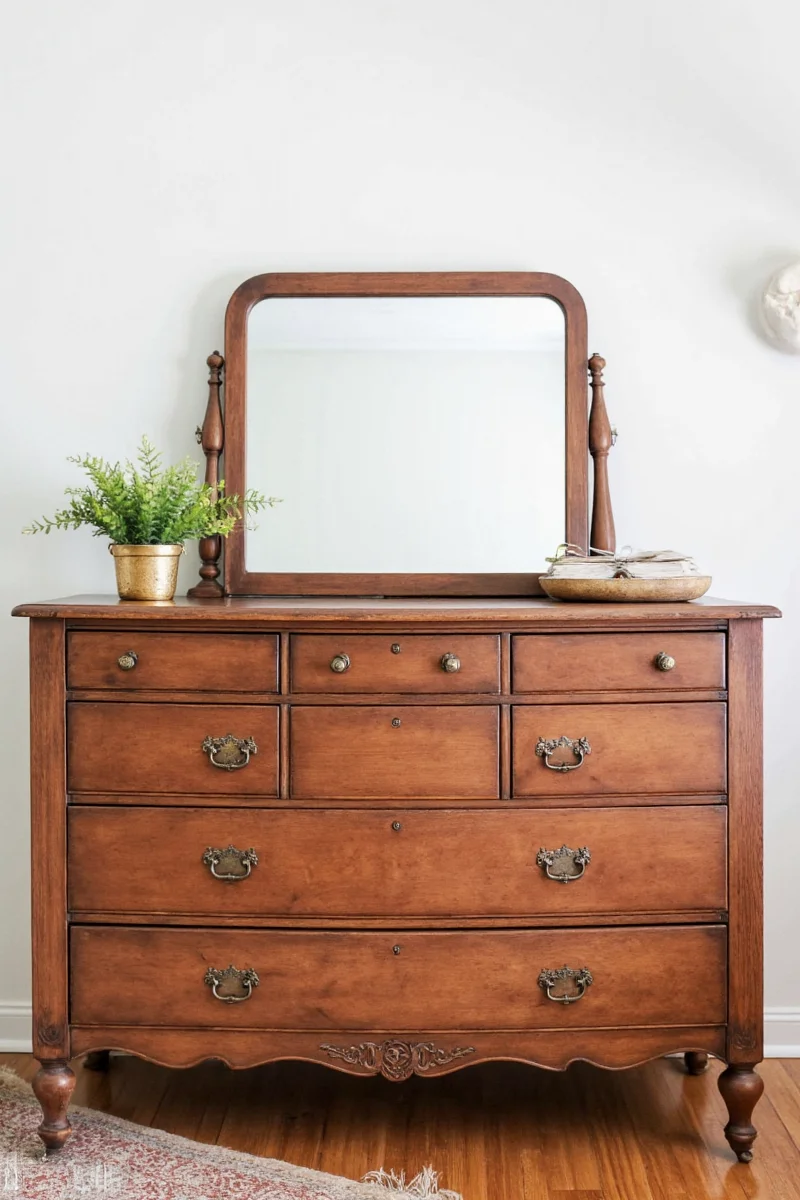 Antique dresser with corner guards and wall anchor