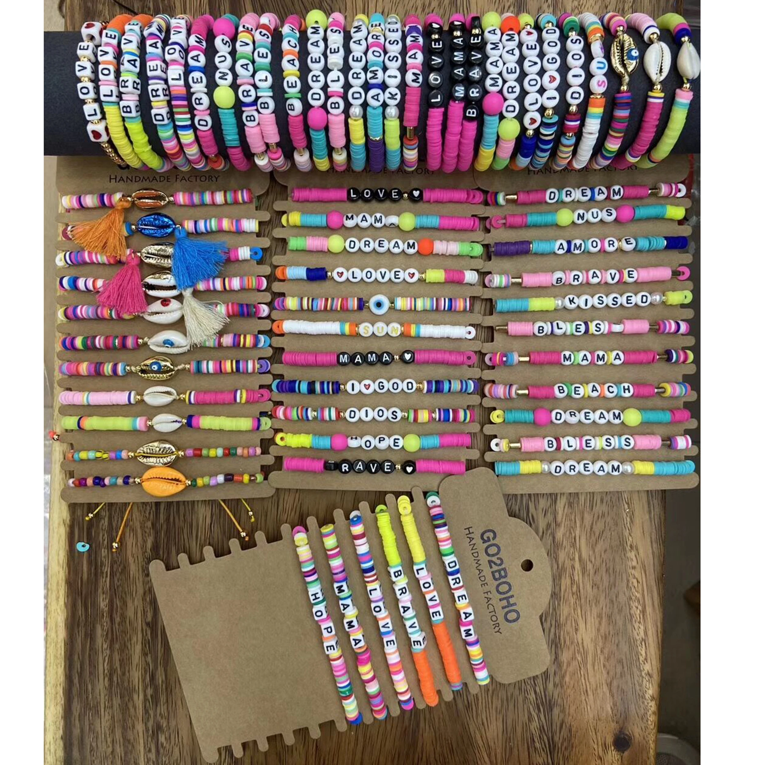 

LS-A2609 fashion multi color heishi beads bracelet,luxury letter words friendship bracelet,shell charm tassel elastic bracelet, Multi-colors