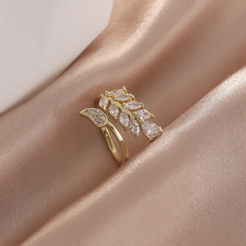 

2023 Newest Jewelry 18k Gold Planted Micro Inlaid Cz Leaf Blade Open Ring Cubic Zirconia Moon Star Adjustable Ring For Woman