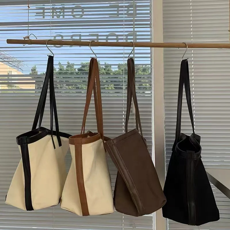 

Fashionable Korean version of large-capacity canvas stitching shoulder bag, lady tote bag, wild art and simple canvas handbag