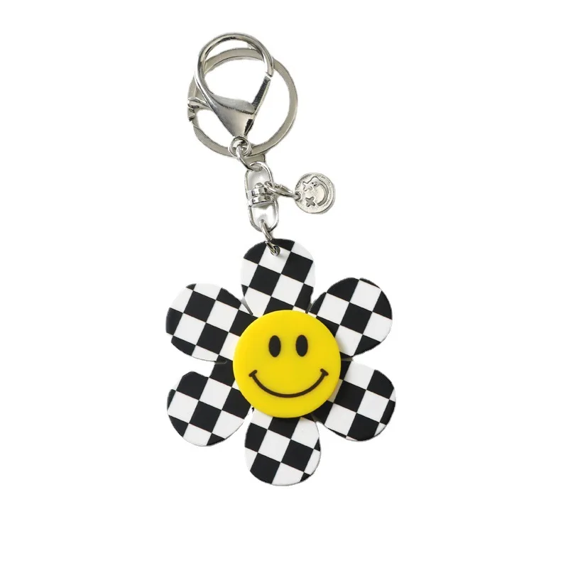 

Black And White Plaid Acrylic Soft Rotating Smiley Colorful Sunflower For Keychain