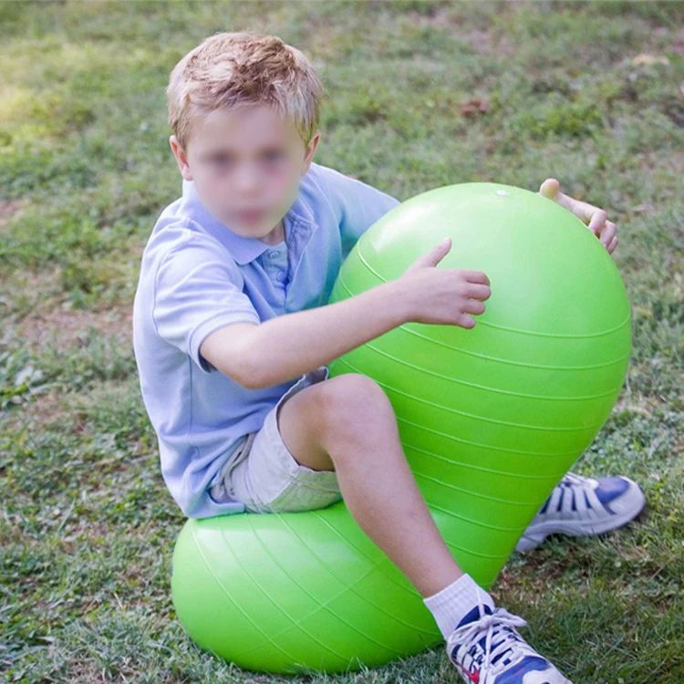 

Wholesale gym stability pvc air stability inflatable peanut exercise ball for Autistic Children, 3 color