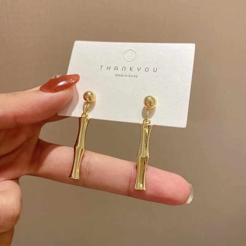 

Wholesale Trendy 18K Gold Plated Long Bamboo Stick Earrings Minimalist Bamboo Shape Drop Earrings