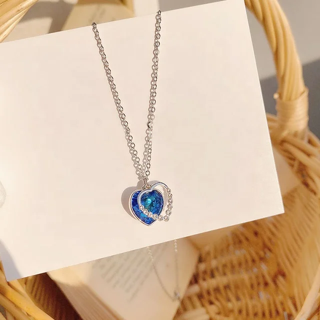 

ADELANTE Fashion Personalized Clavicle Chain Heart Of The Ocean Design Blue Zircon Pendant Love Necklace Womens