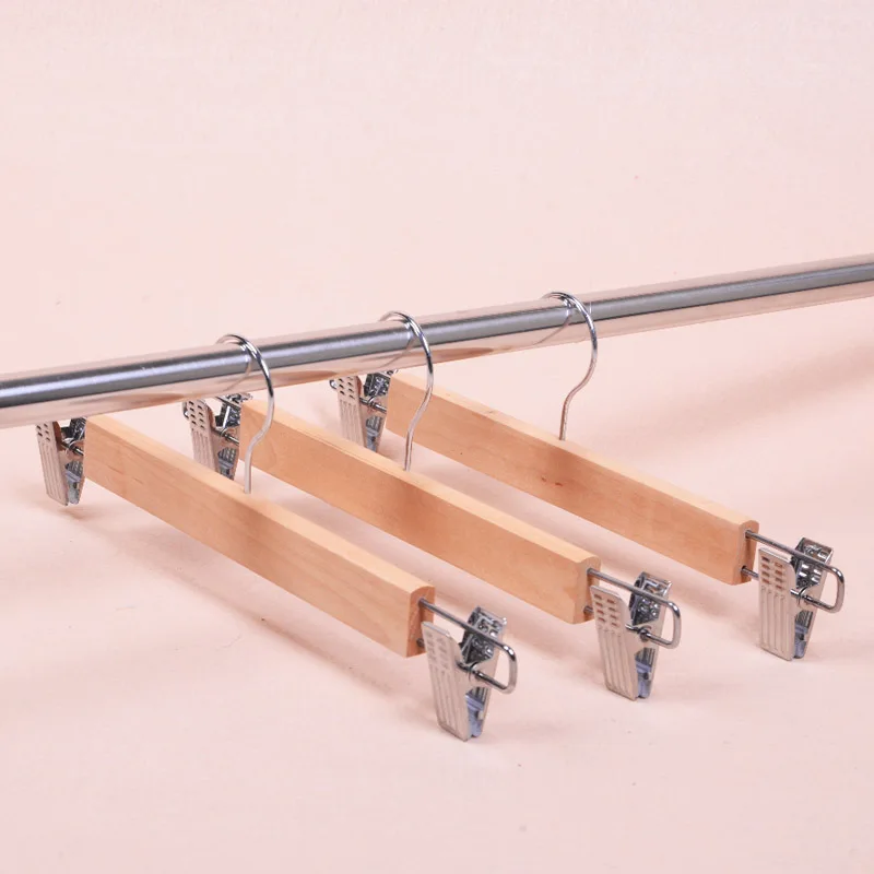 

High Quality Natural Wood Swivel Hook Skirt Pants Hanger With Chrome Clips