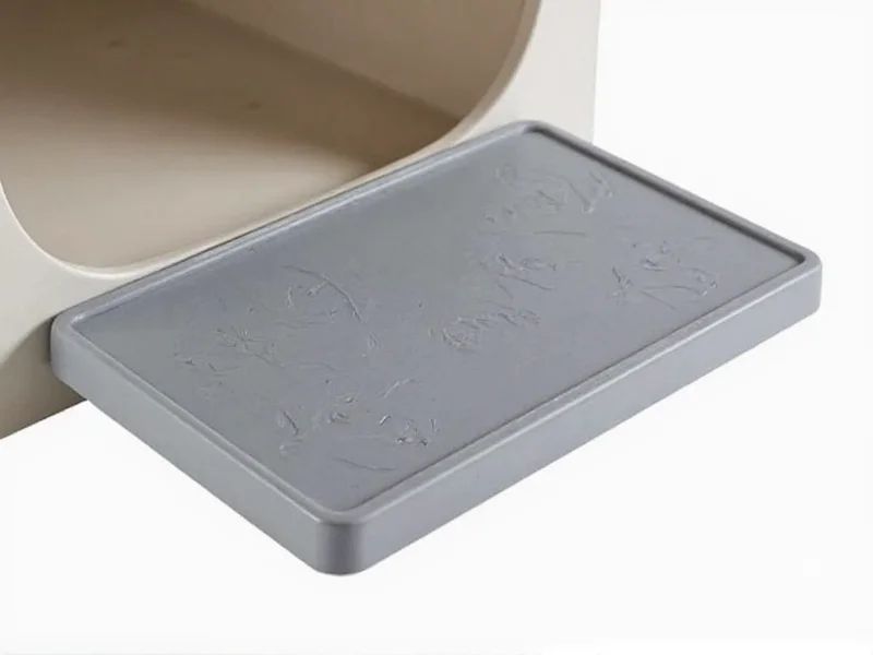 Close-up of litter box entry ramp with non-slip surface