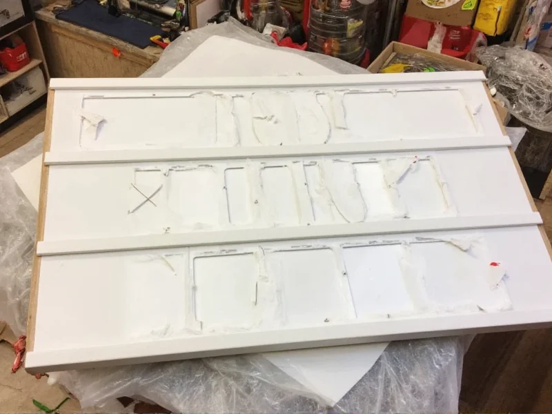 DIY light box frame assembly with labeled panels and window cutouts