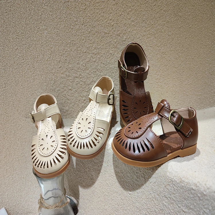 

2021 spring and summer new girls Baotou sandals fashionable hollow beach shoes
