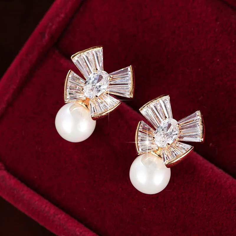 

Fashion hot pearl Bow Earrings women's sweet accessories simple temperament versatile COPPER EARRINGS, Picture shows