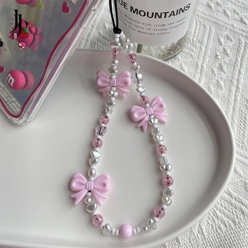 

JOJO Fashion 2023 Pink Acrylic Bow Phone Chain Insta Hot Sale Plastic Beaded mobile phone chains Women