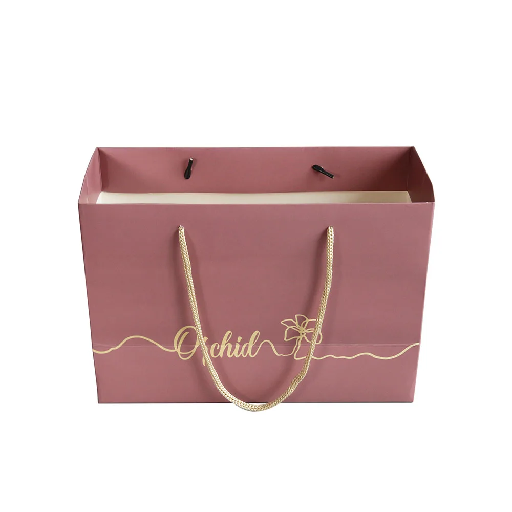 

Wholesale Custom Luxury Ribbon Handle Pink Gift Pack Shopping Paper Bag With Your Own Logo For Cosmetic