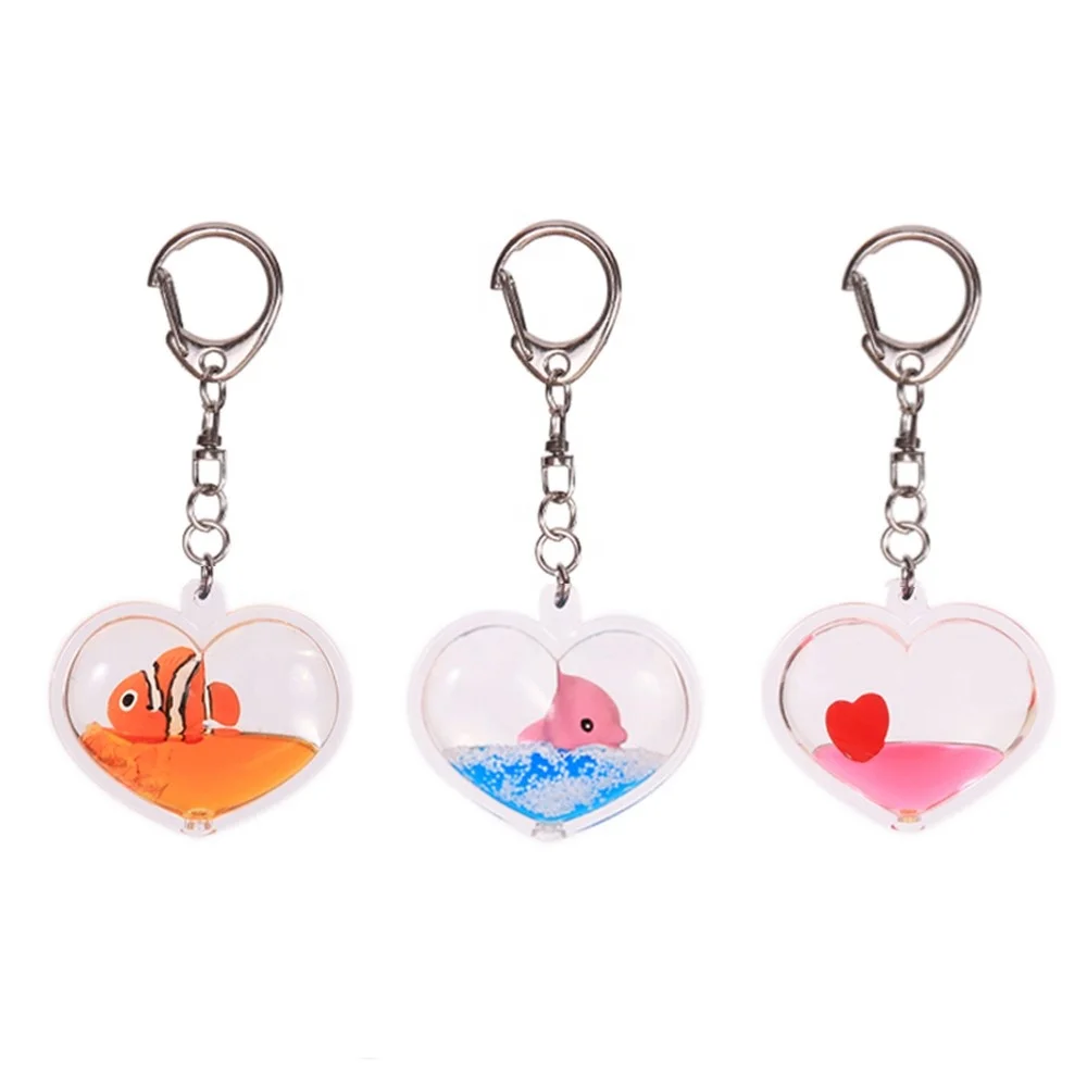 

Custom floating keychains acrylic heart shape water 3D small dolphin floating kering with liquid inside, Custom keychain liquid