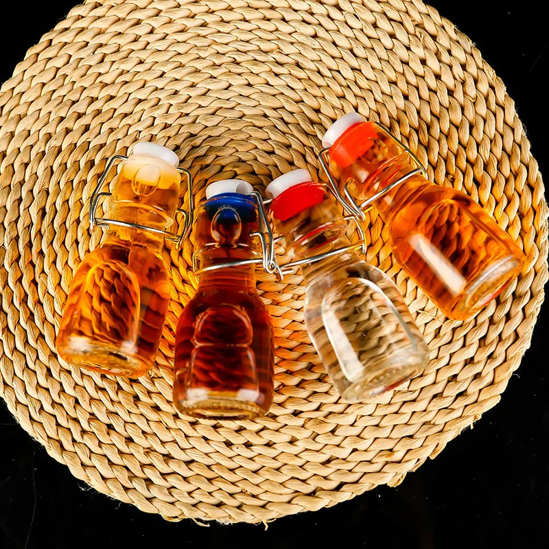 
Wholesale buckle bottle mini glass empty bottle 60ml thick small size wine bottle with lid 