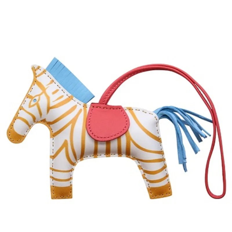 

Mini Genuine Leather Hand Stitching Spraying Pony Bag Pendant Female Tassel Small Jewelry Factory Spot Multicolor, Customized color