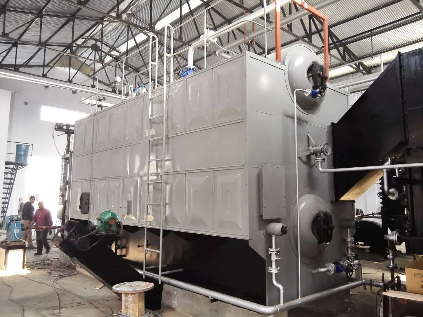 12T/H SZL coal boiler front view during installation - Pakistan