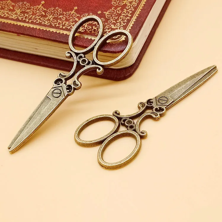 

Antique Silver tone/Antique Bronze Hollow Scissors Pendant Charm/Finding Bracelet Necklace Charm DIY Accessory Jewelry Making, Picture