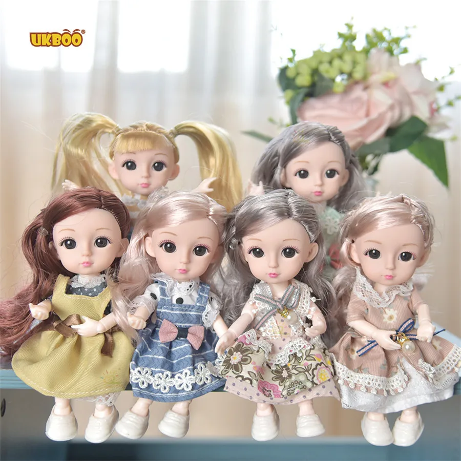 

Free Shipping MOQ one 15cm Mini Dressing up Ddung 6 Dolls Korean Anime Gold hair Joint Body Cute Baby Children Toy Dolls