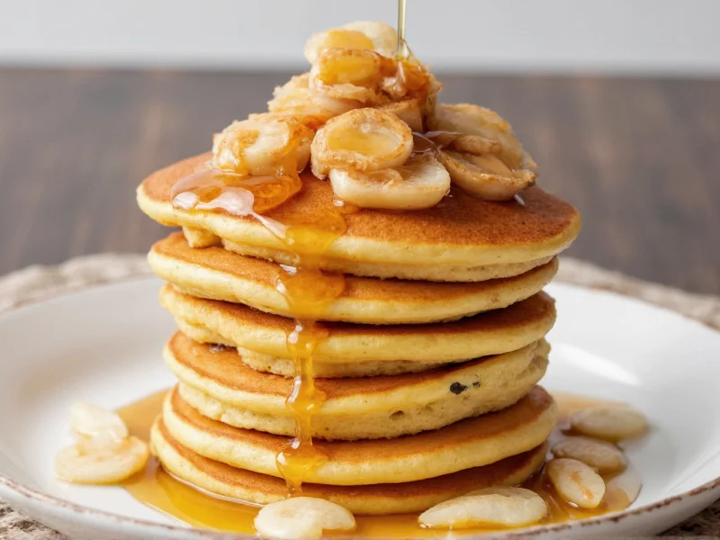 Fluffy pancake stack with maple syrup drizzle