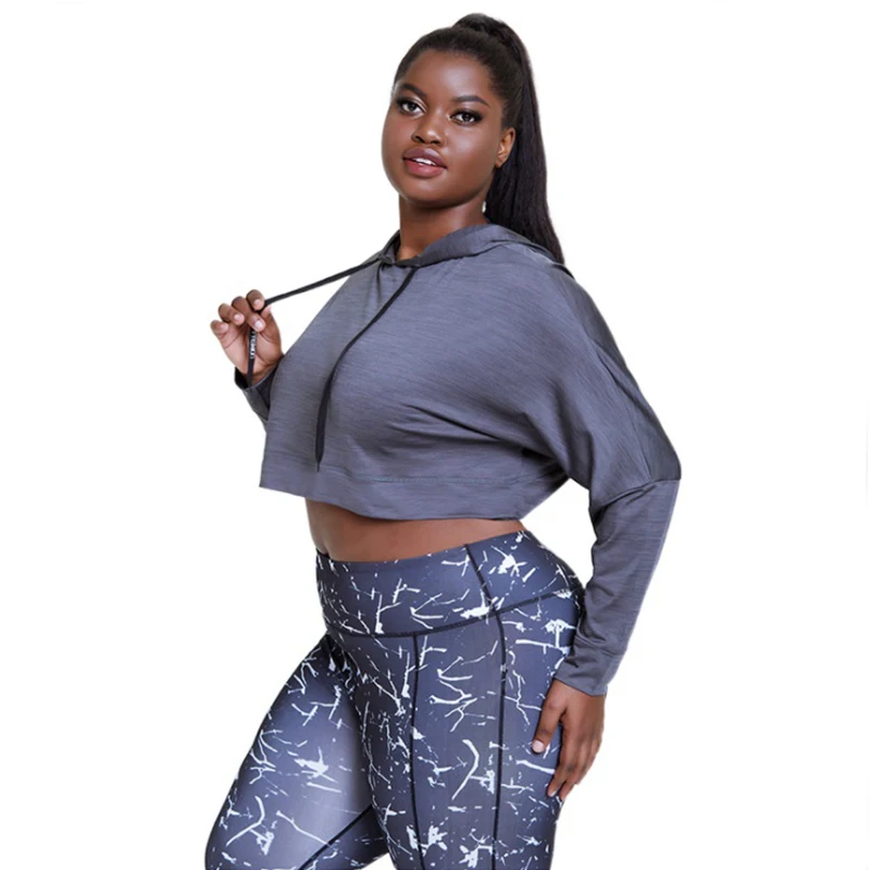 

New loose casual solid color long sleeve hooded T-shirt women's sports fitness plus size tops