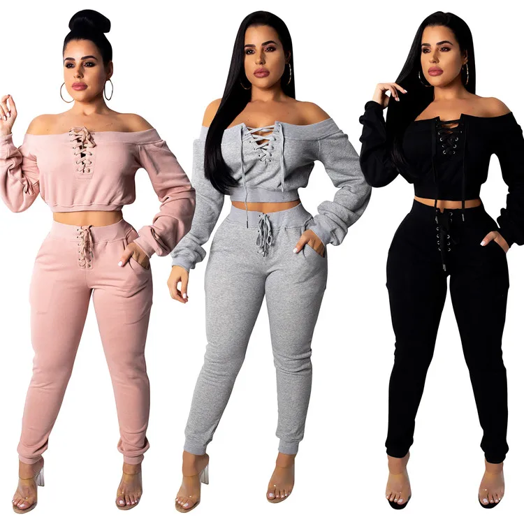 

2021 new fall high quality customized logo solid color long sleeve bandage crop top women tracksuit sport fashion two piece set