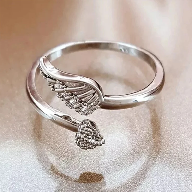 

Romantic and Elegant Men's Proposal Engagement Wedding Rings Silver Feather Heart Shaped Women's Open Ring