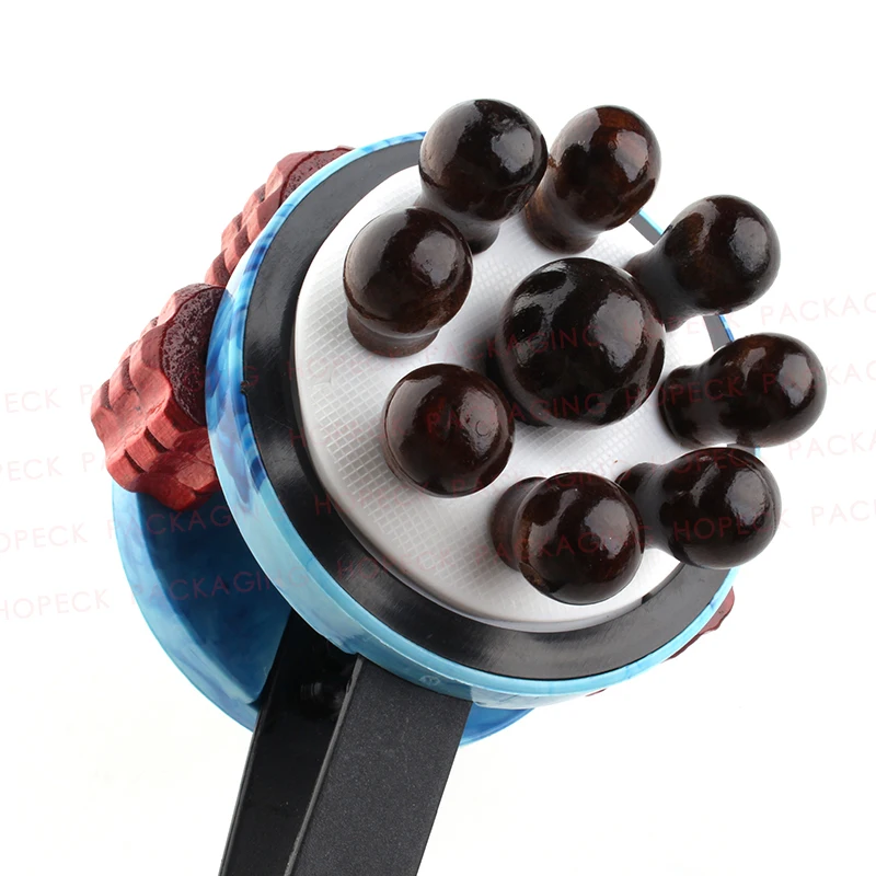 
Multi-functional body massager with plastic blue handle and comb&roller applicator 