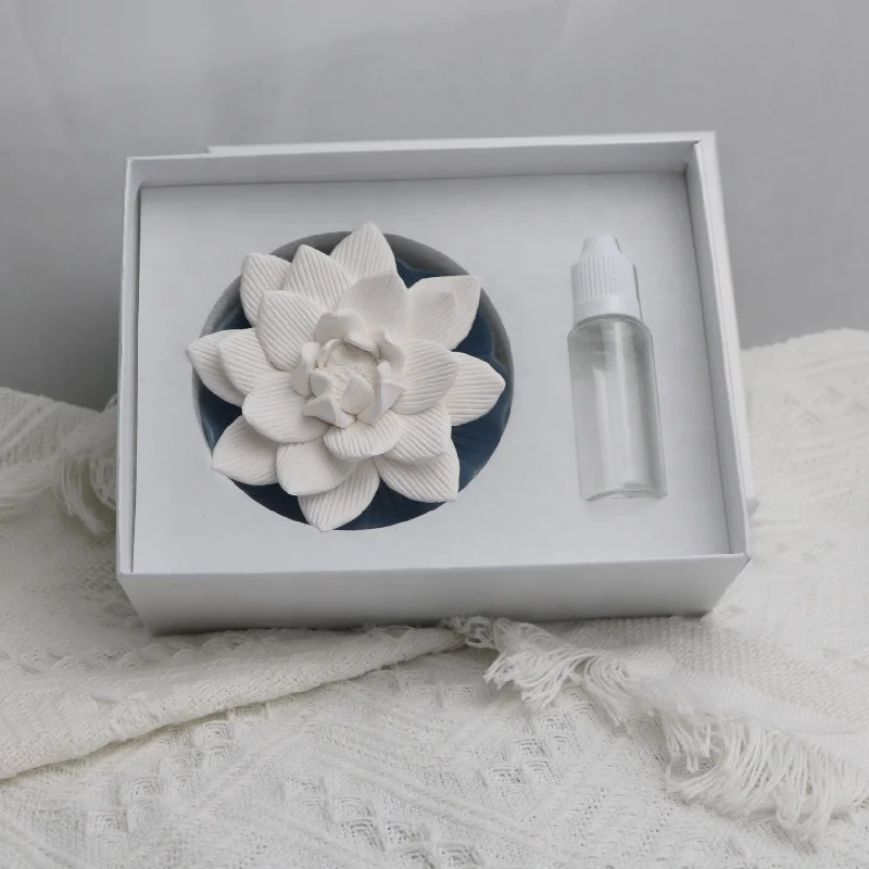 

Stocked Home Car Decoration Blue Lotus Flower Shaped Ceramic Scented Aroma Stone Essential Oil Diffuser Air Freshener, White