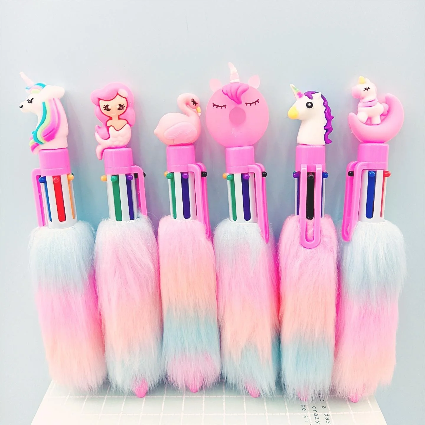 

Wholesale cartoon cute rainbow plush 6 color fluffy unicorn pen for kids