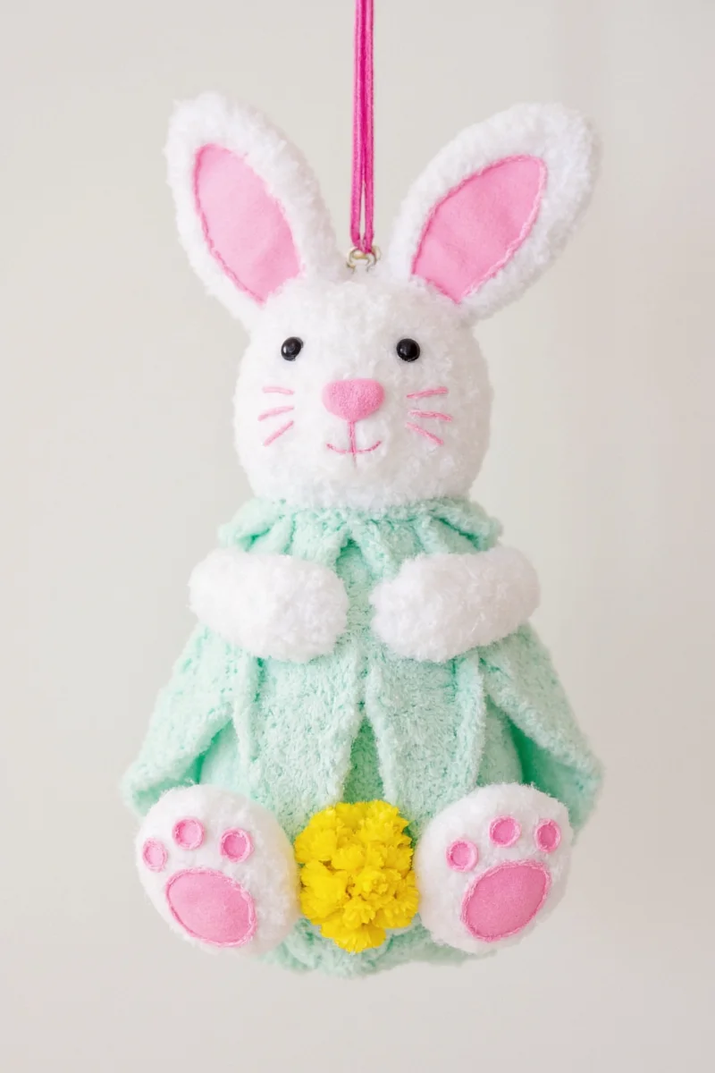 Glass jar filled with pastel Easter eggs