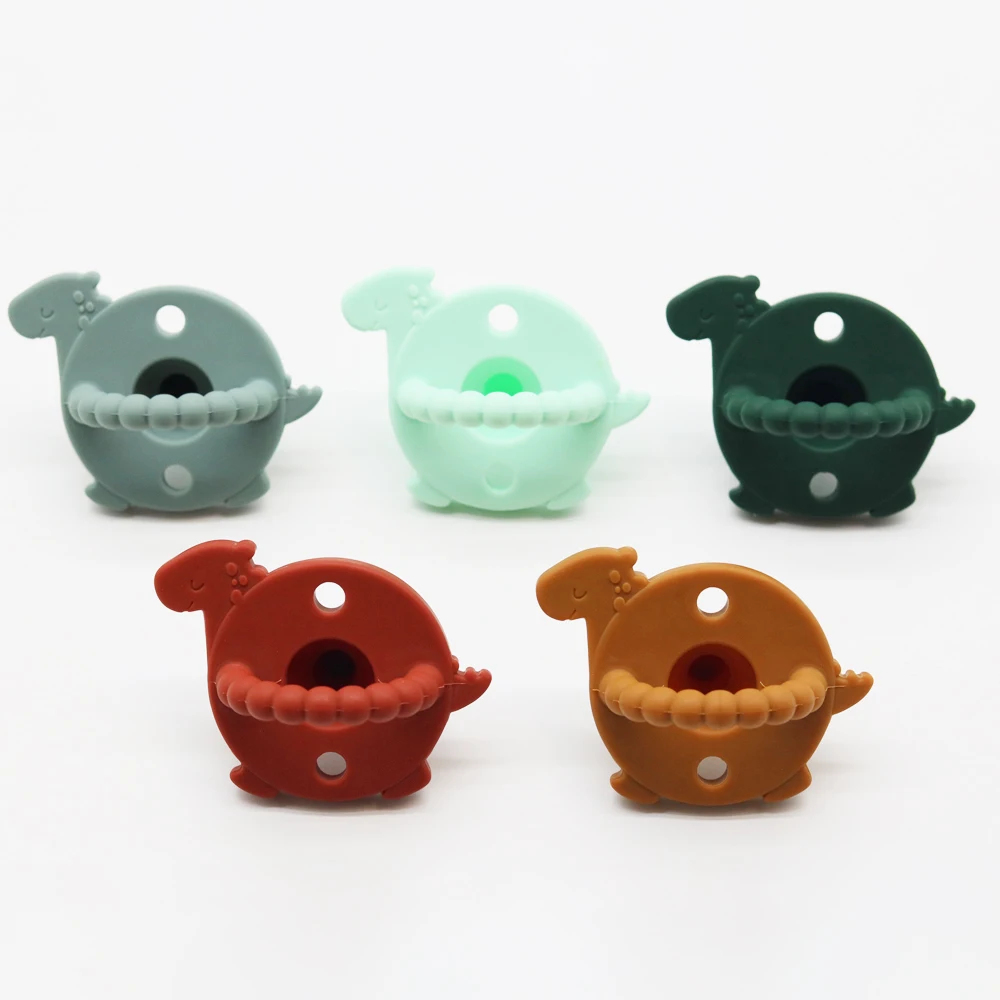 

Wholesale dinosaur Shape Safety Soft Food Grade Silicone Baby Pacifier, Custom