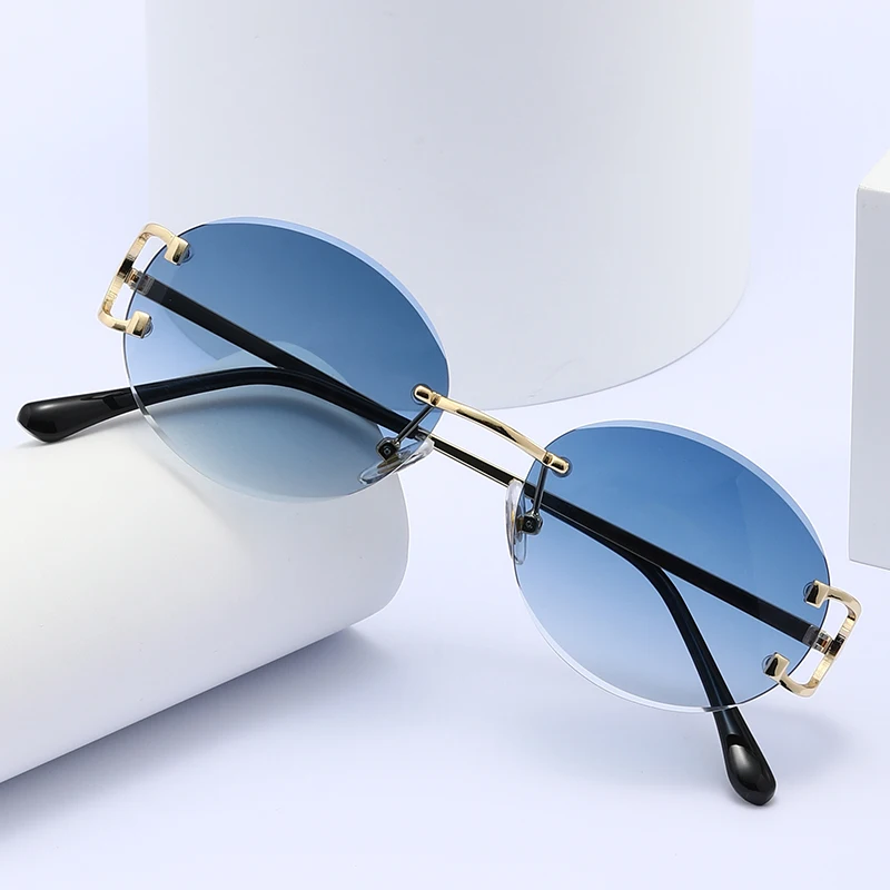 

New design fashion classic style rimless metal women men colorful UV400 luxury sunglasses 2023