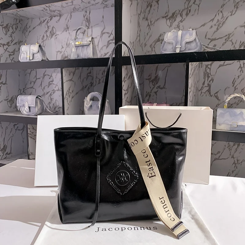 Guangzhou factory wholesale 2024 new women's handbags high-quality PU leather original design Tote bag custom logo