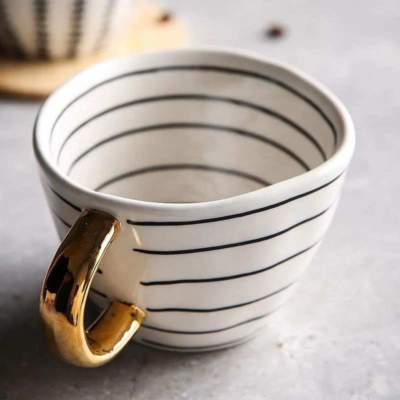 

Wholesale Modern Coffee Cup With Irregular Shape Unique Geometric Pattern And Golden Handle Handmade Coffee Mugs, As picture shows